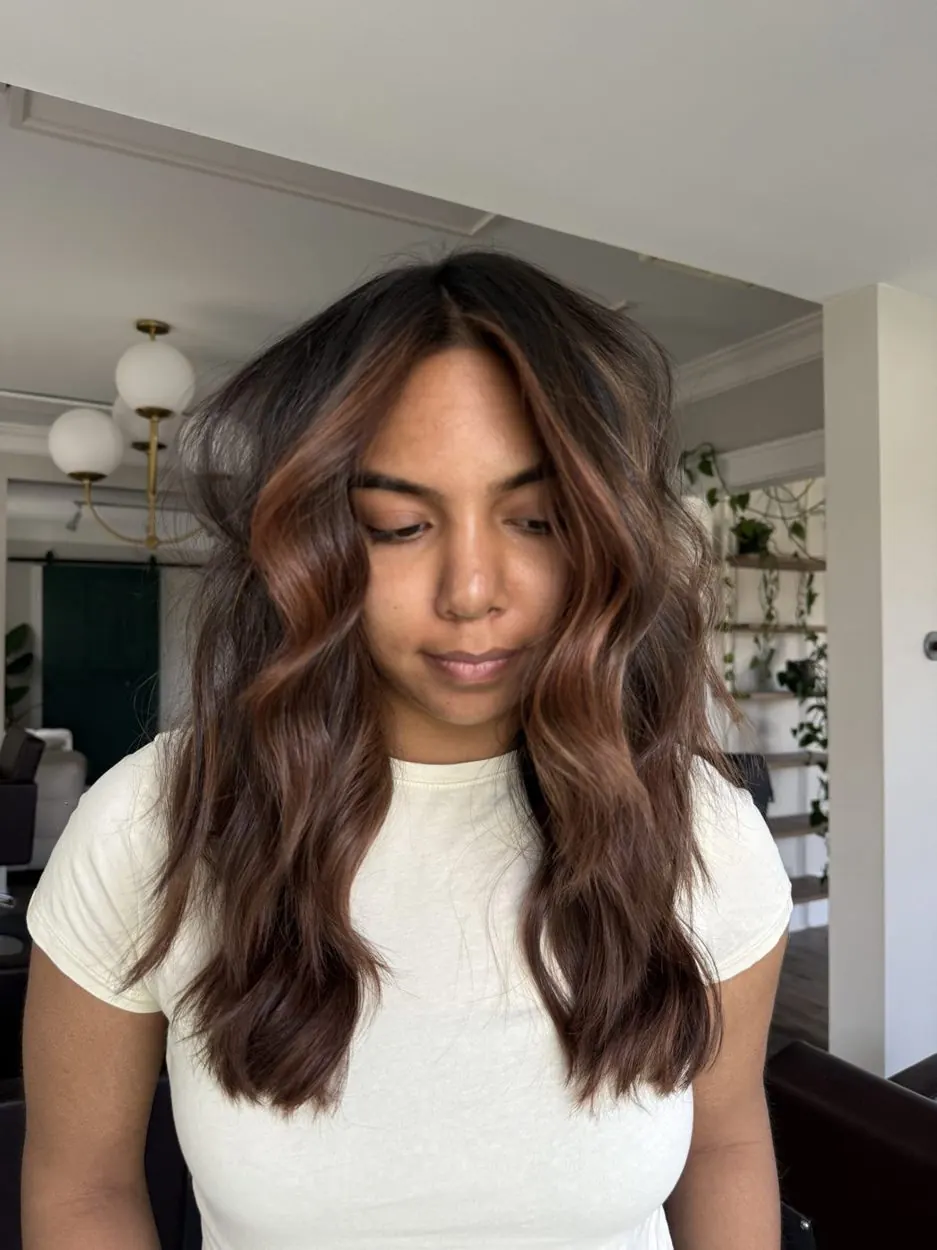 Dark brunette with cinnamon copper face-framing pieces by hairxlaina