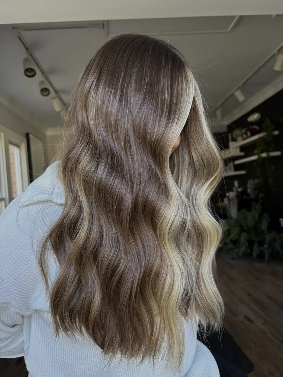 Dimensional bronde balayage with soft waves by hairxlaina, Northville MI