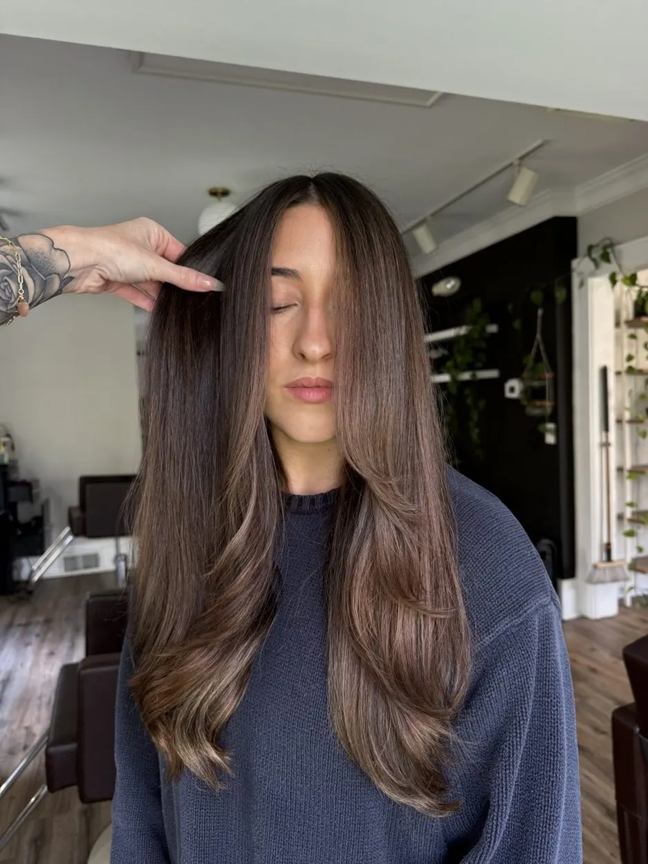 Sleek chocolate brunette with lived-in balayage by hairxlaina